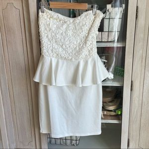 Cream strapless peplum lace dress